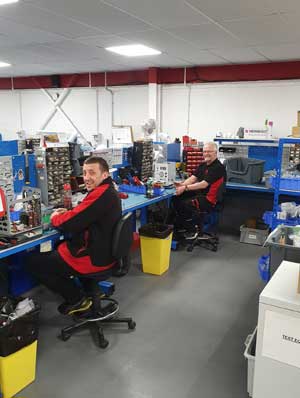 Seaward employees John Harrison and Keith Wood work on manufacturing vital equipment.